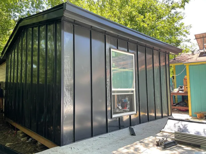 Black standing seam metal wall panels for Roof Inspection in Coto de Caza