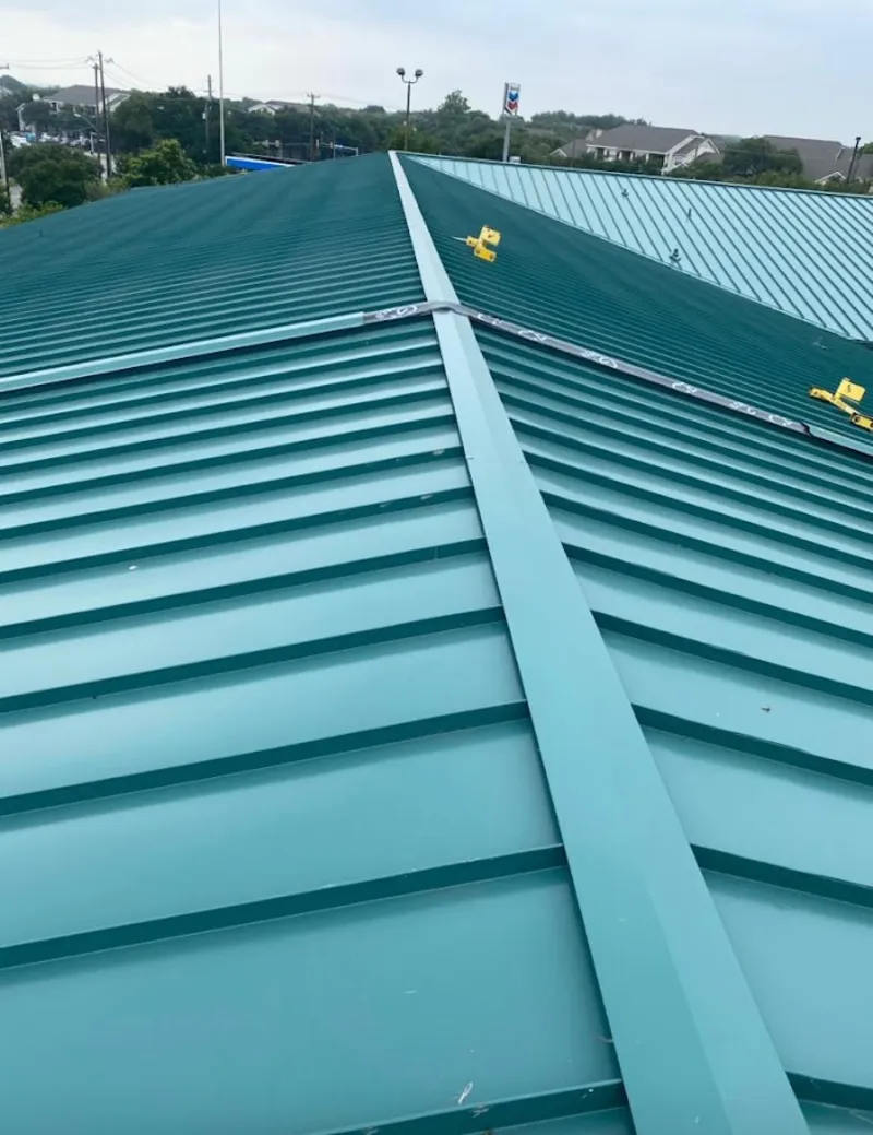 Green commercial metal roof ridge and valley for Metal Roof Repair in Coto de Caza